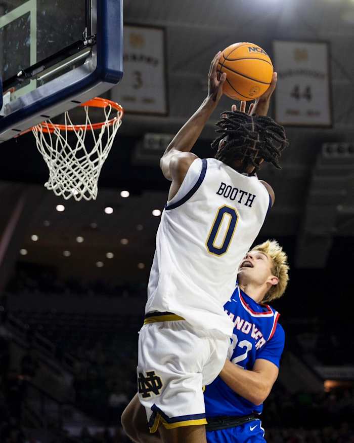 Carey Booth Takes A fading jump shot over pre-season opponent Hanover.